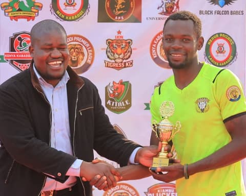 Rodgers Omondi receives the Season 2 men’s Most Valuable Player trophy.