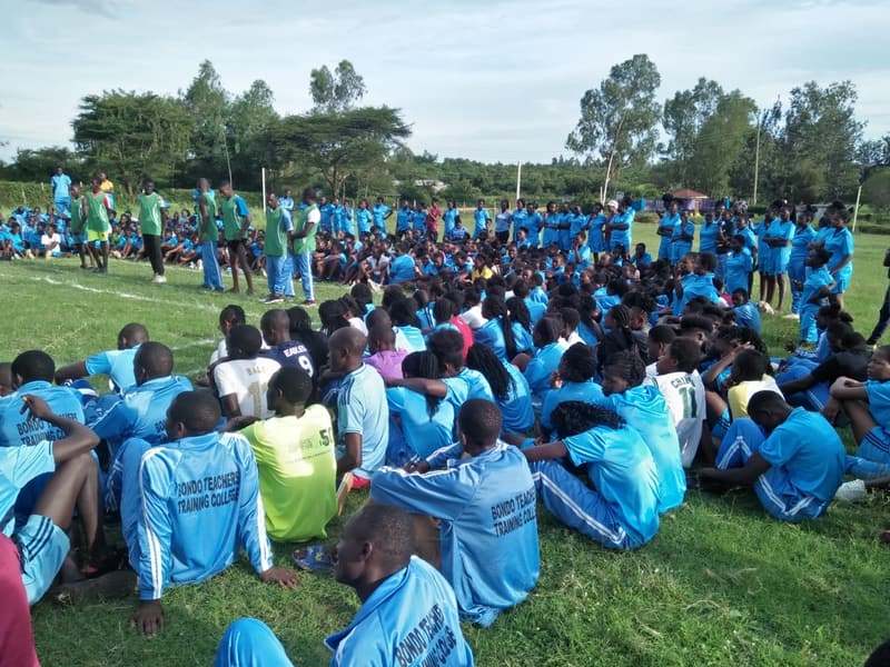 Students gathered on the field at Bondo Teachers Training College for an introductory kabaddi match.