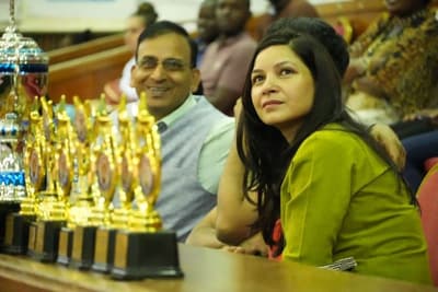 Guests seated behind the trophies at the KKPL Season 1 finals.