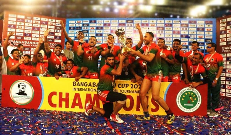 The 2024 Bangabandhu Cup champions celebrate on the podium in Dhaka.