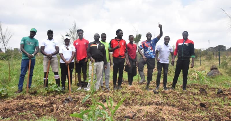 KKU and Kenya Academy of Sports staff and athletes at the tree-planting site on Mazingira Day.